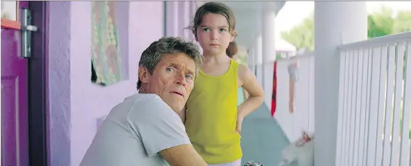  ?? A24 ?? Bobby the manager, played by Willem Dafoe, is seen with Brooklynn Prince’s character Moonee in The Florida Project.