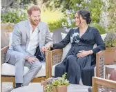  ?? JOE PUGLIESE/HARPO PRODUCTION­S ?? Prince Harry, left, and his wife, Meghan, open up about race and the royal family during an interview with television host Oprah Winfrey.