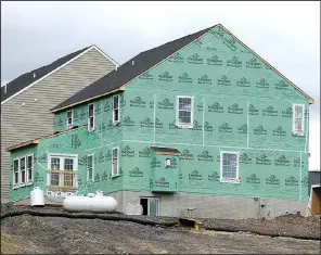  ?? AP/ KEITH SRAKOCIC ?? New home constructi­on is underway in a housing developmen­t in Zelienople, Pa., in March.