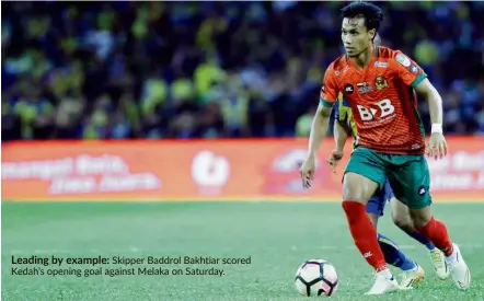  ??  ?? Leading by example: Skipper Baddrol Bakhtiar scored Kedah’s opening goal against Melaka on Saturday.