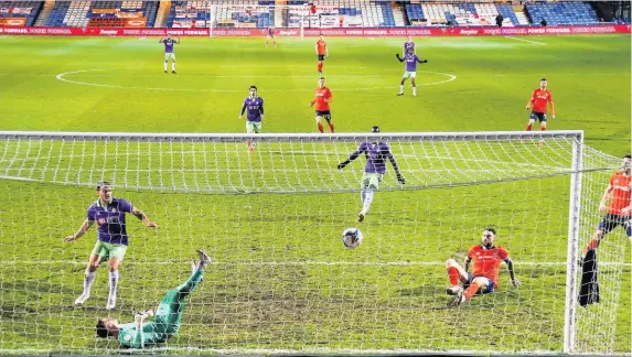  ?? Pictures: Rogan Thomson/JMP ?? Luton Town’s Sonny Bradley puts the ball in the back of his own net off a cross by Bristol City’s Nahki Wells, to make it 1-1 during last night’s game