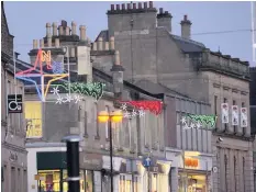  ??  ?? Let there be light Community boards will decide if festive lighting makes a return to town centres next year