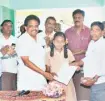  ?? ?? Madurai MP Su. Venkatesan handing over a letter to student S. Dhanya Sri of Ottakovilp­atti Panchayat Union Middle School.