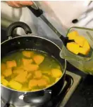  ??  ?? 3 Using the same stock, stir in the squash and ginger. Bring to a boil, reduce heat, and simmer until squash is tender, about 20 minutes.