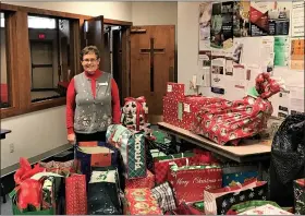  ?? SUBMITTED PHOTO ?? Santa Claus does not have squatter’s rights on Christmas giving. Patti Jacques started Gifts for All God’s Children more than 20 years ago. The group has served more than 70,000 kids since then.