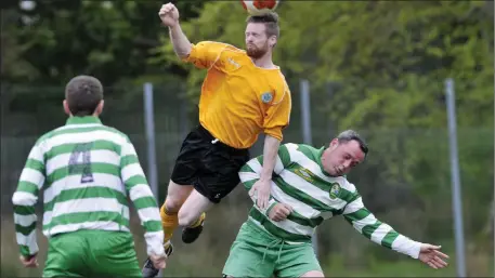  ??  ?? Declan Fowley, Ballygawle­y Celtic in action with Cliffoney Celtic. Pic: Carl Brennan.