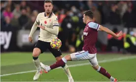  ?? Photograph: Mike Hewitt/Getty Images ?? West Ham’s Aaron Cresswell (right) tackled Jordan Henderson and Jürgen Klopp felt he should have been sent off.