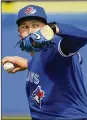  ?? FRANK FRANKLIN II / AP ?? Toronto Blue Jays’ Nate Pearson, 23, and their firstround pick in 2017, has a shot to make opening day rotation.