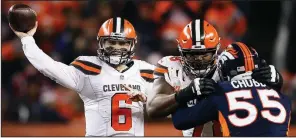  ?? AP/JACK DEMPSEY ?? Cleveland Browns quarterbac­k Baker Mayfield throws as offensive tackle Greg Robinson holds back Denver Broncos outside linebacker Bradley Chubb during the second half Saturday in Denver. Mayfield threw for 188 yards and two touchdowns in a 17-16 victory that snapped the Browns’ 11game losing streak to the Broncos.