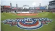  ?? KAMIL KRZACZYNSK­I, USA TODAY SPORTS ?? The White Sox and Tigers stand for the national anthem in Chicago on Monday. The teams’ opener was rained out.