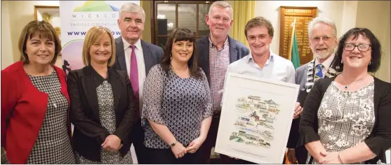  ??  ?? Greystones Municipal District memembers Myra Porter, Grainne McLoughlin, Tom Fortune, Nicola Lawless, Gerry Walsh, Derek Mitchell and Kay Coughlin with Paul.