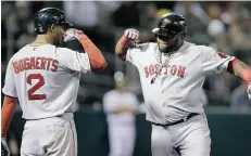  ?? Ben Margot/The Associated Press ?? The Boston Red Sox’s Pablo Sandoval, right, celebrates with Xander Bogaerts after hitting a homer Monday.