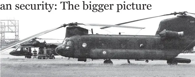  ?? FILE ?? In this March 21, 2006 file photo, helicopter­s from the United States Military sit at the Norman Manley Internatio­nal Airport in Kingston as part of the security exercise called Tradewinds to assist the Caribbean region with security preparatio­ns for World Cup Cricket 2007.