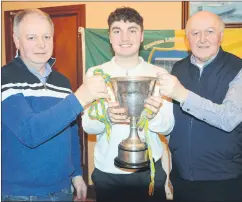  ?? (Pic: P O’Dwyer) ?? Niall Hazelwood, man of the match in the North Cork JB1 Championsh­ip (2023) winning side, with his dad Mike and uncle Bobby, secretary Castletown­roche GAA, at the presentati­on of medals in The Castle Arms last Friday night.