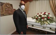  ?? WILFREDO LEE — THE ASSOCIATED PRESS ?? Andre Dawson poses for a photo at Paradise Memorial Funeral Home in Miami. For the baseball Hall of Famer, owning a funeral home has taken some getting used to. Now he’s adjusting to life as a mortician in Miami during a global pandemic.