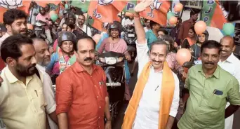  ?? ?? Kick-starting campaigns: BJP candidate M.T. Ramesh greeting the public during a road show in Kozhikode on Sunday after his candidatur­e to the Lok Sabha was announced.