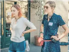  ?? ELEVATION PICTURES ?? Greta Gerwig, right, with Saoirse Ronan on the set of Lady Bird, is the fifth woman to receive a best director nod.