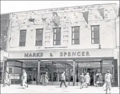  ?? ?? The store is no more - and the clock, obscured by bunting in this image from 1980, has gone too