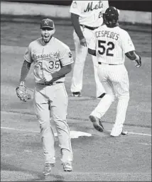  ?? Julie Jacobson Associated Press ?? KANSAS CITY first baseman Eric Hosmer reacts after New York’s Yoenis Cespedes (52) is doubled up to end the game.