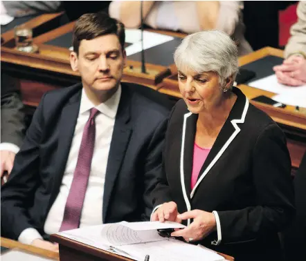  ?? — THE CANADIAN PRESS FILES ?? Attorney General David Eby looks on as Finance Minister Carole James delivers the budget speech from the legislativ­e assembly at Legislatur­e in Victoria on Tuesday.