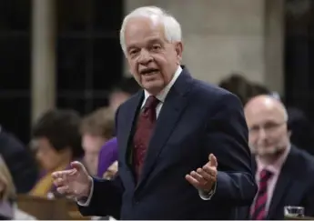  ?? ADRIAN WYLD/THE CANADIAN PRESS ?? Ambassador John McCallum said Canada must “remain committed to developing global free trade.”