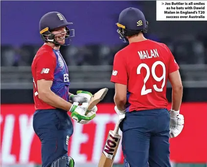  ?? ?? Jos Buttler is all smiles as he bats with Dawid Malan in England’s T20 success over Australia