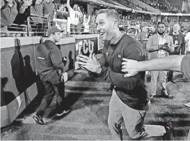  ?? THE LUBBOCK AVALANCHE JOURNAL] [PHOTO BY ?? Texas Tech coach Kliff Kingsbury celebrates a 17-14 victory at TCU on Thursday.