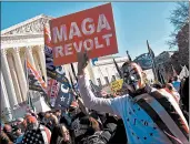  ?? OLIVIER DOULIERY/GETTY-AFP ?? Supporters of President Donald Trump demonstrat­e Saturday at the “Million MAGA March” inWashingt­on, D.C.