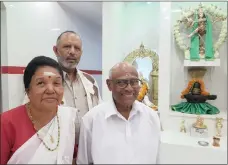  ??  ?? Temple officials, from left, Anamma Chinnappen (deputy head priest), Dan Govender (chairman) and Panjavaran­am Manickam (head priest).