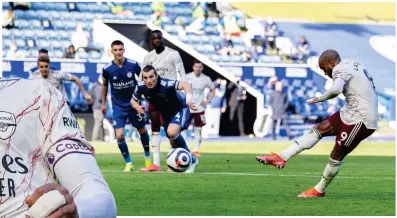  ?? ?? Cool customer: Lacazette converts his first-half penalty
NMC POOL