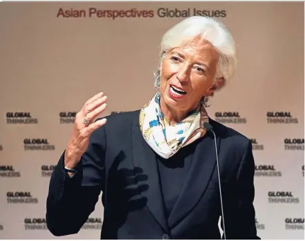  ?? — Reuters ?? Economic threats: Lagarde delivering her speech at the University of Hong Kong. She says threats to the world economy loom, most notably a surge in protection­ism.