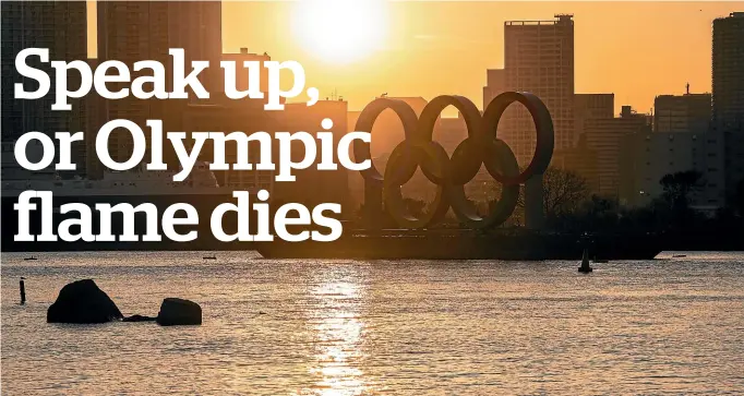  ?? GETTY IMAGES ?? The sun sets behind the Tokyo Olympic rings this week.