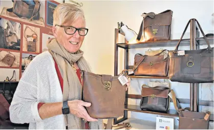  ?? DESIREE ANSTEY/JOURNAL PIONEER ?? Janie-Nicole Henderson in her growing store, where items will be available at the Summerside Farmers’ Market starting on Saturday.