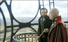  ??  ?? Guild of Historians Thaddeus Valentine (Hugo Weaving) consults with London Lord Mayor Magnus Crome (Patrick Malahide) in Christian Rivers’