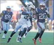  ?? [AP PHOTO] ?? New England running back Sony Michel, right, runs away from Los Angeles Chargers safety Derwin James during Sunday’s playoff game in Foxborough, Mass.