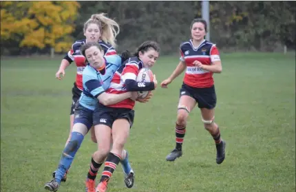  ?? Photo: John Rice. ?? Leah Coffey is hanging on for dear life until help arrives during Wicklow’s great win over Barnhall on Sunday.