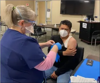  ?? COURTESY PHOTO ?? Filmmaker Roy Dorantes is shown here receiving his first-round COVID-19 vaccinatio­n Jan. 3 at El Centro Regional Medical Center.