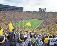  ?? DIANE WEISS/DFP ?? University of Michigan football players and other college athletes in the state would be allowed to enter into certain sponsorshi­p and advertisin­g agreements in 2023 under legislatio­n passed in the state Senate.