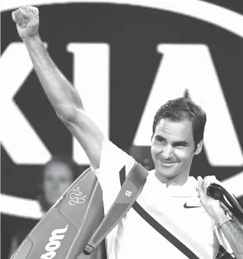  ?? AGENCE FRANCE PRESSE ?? Switzerlan­d's Roger Federer waves after South Korea's Chung Hyeon retired from their men's singles semifinals match on day 12 of the Australian Open tennis tournament in Melbourne.