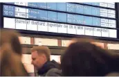  ?? FOTO: DPA ?? Im Bahnhof Essen ist an der Anzeigenta­fel zu lesen, dass der Zugverkehr in NRW eingestell­t wird.