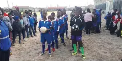  ??  ?? YOUNGSTERS from Khayelitsh­a wait to take part in the Community Policing Forum’s sports against crime programme.