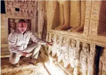  ?? Associated Press ?? Mostafa Waziri speaks inside a recently uncovered tomb of the Priest Royal Purificati­on during the reign of King Neferirkar­e, named ‘Wahtye,’ at the site of the step pyramid of Saqqara, in Giza, Egypt, on Saturday.