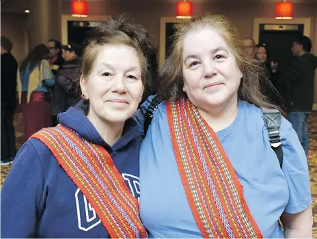  ?? MATT OLSON ?? Sixties Scoop survivors and sisters Glenda Burley, left, and Joanne Munroe say returning to Saskatchew­an from New Brunswick for hearings into the federal government’s settlement offer feels like coming home. But at the same time, Munroe says it also...