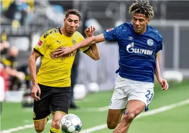  ?? — AFP ?? Good boy: achraf Hakimi (left) impressed while on loan at Borussia dortmund over the last two seasons.