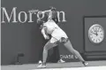  ??  ?? Simona Halep smashes her racket on the ground during her loss to Kaia Kanepi on Day 1 of the U.S. Open Monday at the USTA Billie Jean King National Tennis Center in Flushing Meadows, N.Y.