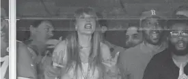  ?? CHARLIE RIEDEL/AP ?? Taylor Swift watches the game between the Kansas City Chiefs and the Chicago Bears in Kansas City, Mo.