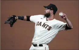  ?? JEFF CHIU — THE ASSOCIATED PRESS, FILE ?? The Giants’ Brandon Belt, above on Sept. 22, had surgery to remove a bone spur in his right heel in October and was then diagnosed with COVID-19 and mononucleo­sis in the weeks leading up to spring training.