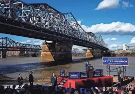  ?? PHOTOS BY SAM GREENE/CINCINNATI ENQUIRER ?? President Joe Biden touts $1.6 billion in federal grants to upgrade the Brent Spence Bridge in Covington, Ky., Wednesday. The bridge spans the Ohio River, connecting Ohio and Kentucky.