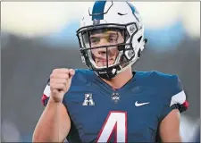  ?? JESSICA HILL/AP PHOTO ?? Quarterbac­k Bryant Shirreffs leads an improved UConn offense into Philadelph­ia today as the Huskies attempt to end a four-game losing streak against Temple in an American Athletic Conference game.