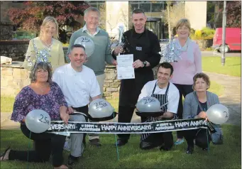  ??  ?? Ready for the barbecue: Front: Cecily Jones, chef Graham Webb, chef Thomas Reynolds, Noeleen Furlong. Back: Dr. Michael and Margaret O’Doherty, head chef William Millar, Frances Hatton.